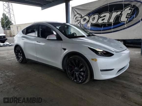 2022 Tesla Model Y Performance с VIN 7SAYGDEF0NF487098, выставлен на аукционе Copart как лот 80744715 с пробегом 39 557 миль миль и Списание • Salvage title. История ставок и продаж доступна на DreamBid. Изображение 4.