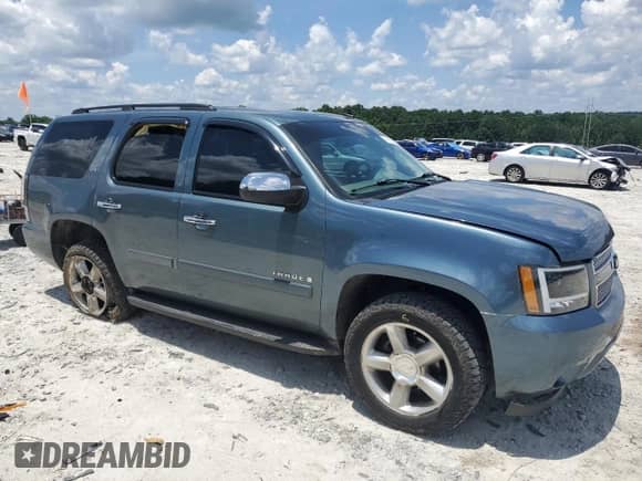 2008 Chevrolet Tahoe LTZ с VIN 1GNFC13J18R118486, выставлен на аукционе Copart как лот 61852875 с пробегом 262 907 миль миль и Списание • Salvage title. История ставок и продаж доступна на DreamBid. Изображение 4.