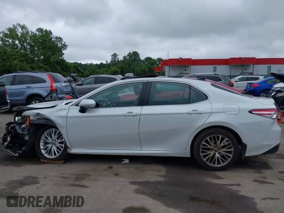 2019 Toyota Camry SE z VIN 4T1B11HK5KU720581, wystawiony jako IAAI lot #42300818 z przebiegiem 136 779 mil mil oraz . Historia ofert i sprzedaży dostępna na DreamBid. Obrazek 14.