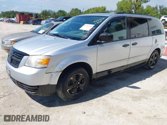 2008 Dodge Grand Caravan SE with VIN 2D8HN44H38R749745, listed as a IAAI auction lot 43359793 with 245,074 mi miles and . Bid and sale history available at DreamBid. Image 2.
