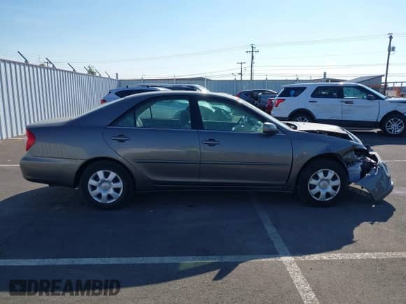 2003 Toyota Camry XLE with VIN 4T1BE32K33U719780, listed as a IAAI auction lot 43107094 with 144,249 mi miles and . Bid and sale history available at DreamBid. Image 13.