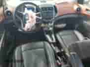 2014 Chevrolet Sonic LTZ z VIN 1G1JE6SB1E4115318, wystawiony jako Copart lot #70573505 z przebiegiem 101 362 mil mil oraz Szkoda całkowita • Salvage title. Historia ofert i sprzedaży dostępna na DreamBid. Obrazek 8.