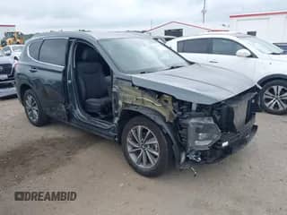 2019 Hyundai Santa Fe SEL with VIN 5NMS3CAD6KH044767, listed as a IAAI auction lot 42602468 with 75,604 mi miles and . Bid and sale history available at DreamBid. Image 1.