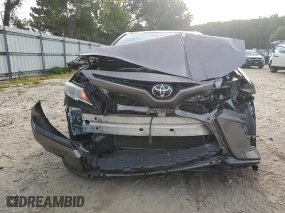 2018 Toyota Camry SE с VIN 4T1B11HK0JU537832, выставлен на аукционе Copart как лот 83764795 с пробегом 71 092 миль миль и Списание • Salvage title. История ставок и продаж доступна на DreamBid. Изображение 5.