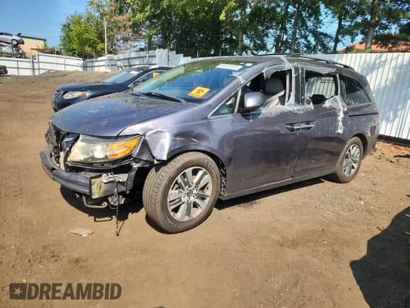 2014 Honda Odyssey Touring с VIN 5FNRL5H94EB092298, выставлен на аукционе Copart как лот 66097915 с пробегом Не указан миль и Чистый • Clean title. История ставок и продаж доступна на DreamBid. Изображение 1.