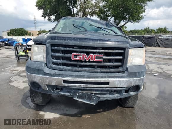 2011 GMC Sierra 1500 Work Truck z VIN 1GTN2TEA4BZ441924, wystawiony jako Copart lot #58874805 z przebiegiem 148 790 mil mil oraz Szkoda całkowita • Salvage title. Historia ofert i sprzedaży dostępna na DreamBid. Obrazek 5.