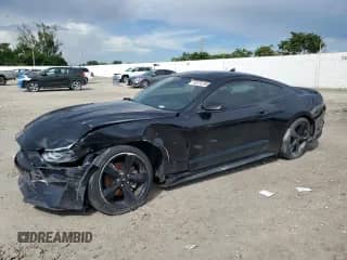 2021 Ford Mustang EcoBoost z VIN 1FA6P8TH3M5146977, wystawiony jako Copart lot #82076765 z przebiegiem 31 301 mil mil oraz Nie do naprawy • Non repairable. Historia ofert i sprzedaży dostępna na DreamBid. Obrazek 1.