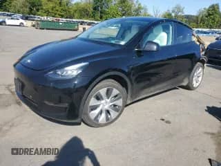 2021 Tesla Model Y Long Range with VIN 5YJYGDEEXMF068761, listed as a Copart auction lot 71468415 with 50,709 mi miles and Salvage title. Bid and sale history available at DreamBid. Image 1.