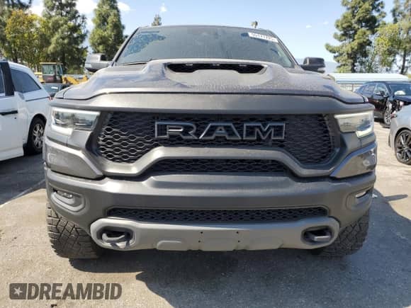 2023 Ram 1500 TRX z VIN 1C6SRFU90PN558994, wystawiony jako Copart lot #55171725 z przebiegiem 17 350 mil mil oraz Szkoda całkowita • Salvage title. Historia ofert i sprzedaży dostępna na DreamBid. Obrazek 5.