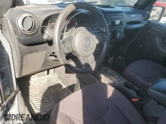 2014 Jeep Wrangler Sport with VIN 1C4AJWAG6EL181224, listed as a Copart auction lot 82060695 with 97,609 mi miles and Clean title. Bid and sale history available at DreamBid. Image 8.