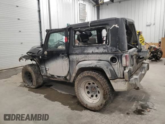 2010 Jeep Wrangler Sport z VIN 1J4AA2D19AL115044, wystawiony jako Copart lot #85518545 z przebiegiem Nie podano mil oraz Nie do naprawy • Non repairable. Historia ofert i sprzedaży dostępna na DreamBid. Obrazek 2.