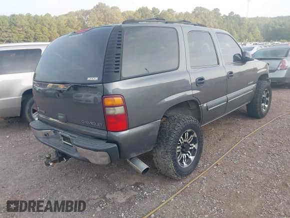 2002 Chevrolet Tahoe LS with VIN 1GNEC13V42J207814, listed as a IAAI auction lot 42787371 with Not provided miles and . Bid and sale history available at DreamBid. Image 4.
