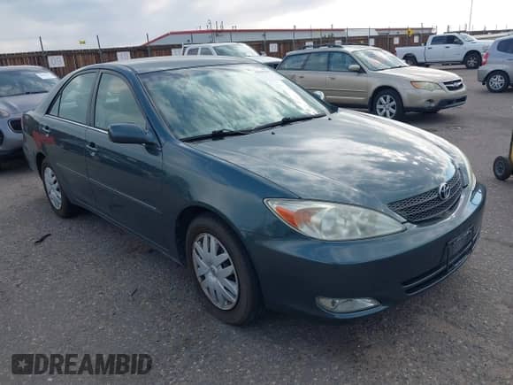 2004 Toyota Camry LE with VIN 4T1BE32K94U339635, listed as a IAAI auction lot 43041101 with 153,448 mi miles and . Bid and sale history available at DreamBid. Image 1.