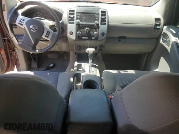 2017 Nissan Frontier Pro-4X with VIN 1N6DD0EV0HN715916, listed as a Copart auction lot 67422285 with 97,386 mi miles and Salvage title. Bid and sale history available at DreamBid. Image 8.