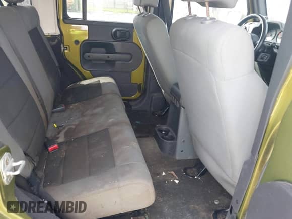 2008 Jeep Wrangler Unlimited X z VIN 1J4GA39138L509500, wystawiony jako IAAI lot #43035206 z przebiegiem 170 506 mil mil oraz . Historia ofert i sprzedaży dostępna na DreamBid. Obrazek 8.