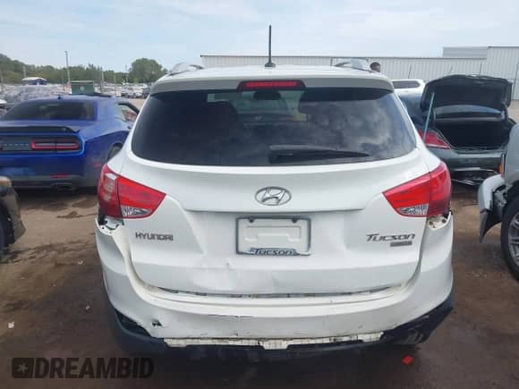 2011 Hyundai Tucson Limited with VIN KM8JU3AC1BU290260, listed as a IAAI auction lot 43415579 with 244,519 mi miles and . Bid and sale history available at DreamBid. Image 16.