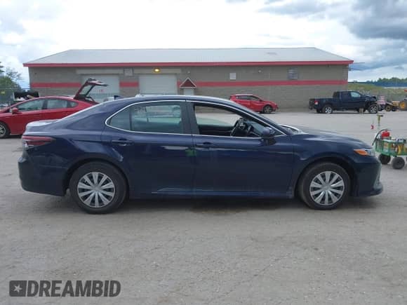 2022 Toyota Camry Hybrid LE with VIN 4T1C31AK7NU039528, listed as a IAAI auction lot 43074615 with 32,641 mi miles and . Bid and sale history available at DreamBid. Image 13.