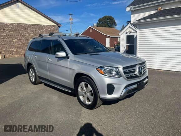 2018 Mercedes-Benz GLS 450 with VIN 4JGDF6EE7JB066263, listed as a Copart auction lot 87436515 with 180,459 mi miles and Clean title. Bid and sale history available at DreamBid. Image 4.