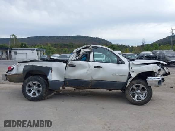 2007 Dodge 1500 SLT with VIN 1D7HU18277S236992, listed as a IAAI auction lot 43392399 with 170,885 mi miles and . Bid and sale history available at DreamBid. Image 13.