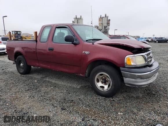 2003 Ford F-150 XL with VIN 1FTRX17283NA09956, listed as a Copart auction lot 81526395 with 195,707 mi miles and Salvage title. Bid and sale history available at DreamBid. Image 4.