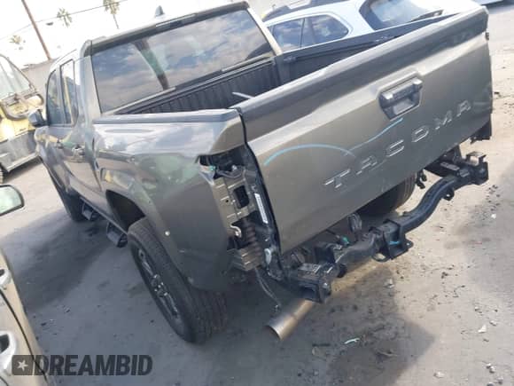 2024 Toyota Tacoma SR5 with VIN 3TMLB5JN1RM043397, listed as a IAAI auction lot 42181997 with 9,254 mi miles and . Bid and sale history available at DreamBid. Image 3.