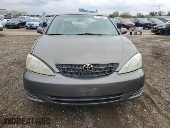 2002 Toyota Camry XLE с VIN 4T1BF32K72U530710, выставлен на аукционе Copart как лот 90708205 с пробегом 215 442 миль миль и Чистый • Clean title. История ставок и продаж доступна на DreamBid. Изображение 5.