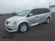 2012 Dodge Grand Caravan Crew with VIN 2C4RDGDGXCR377702, listed as a Copart auction lot 71827965 with 221,594 mi miles and Salvage title. Bid and sale history available at DreamBid. Image 1.