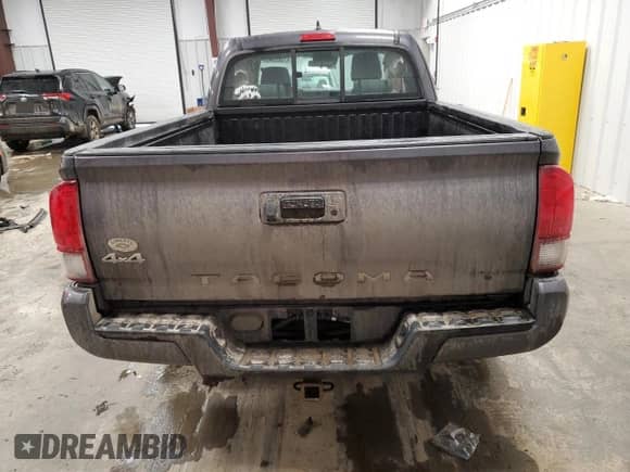 2018 Toyota Tacoma SR with VIN 5TFSX5EN4JX062063, listed as a Copart auction lot 47062045 with 96,087 mi miles and Salvage title. Bid and sale history available at DreamBid. Image 6.
