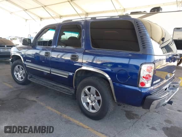 2003 Chevrolet Tahoe LS z VIN 1GNEC13T03J180708, wystawiony jako IAAI lot #41543671 z przebiegiem 203 442 mil mil oraz . Historia ofert i sprzedaży dostępna na DreamBid. Obrazek 3.