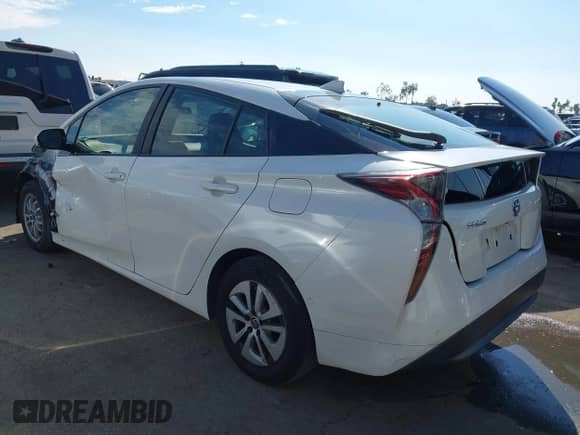 2018 Toyota Prius Two with VIN JTDKBRFUXJ3058120, listed as a IAAI auction lot 43289991 with 116,070 mi miles and . Bid and sale history available at DreamBid. Image 3.