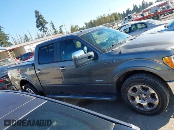 2011 Ford F-150 Lariat with VIN 1FTFW1ET1BFA82757, listed as a IAAI auction lot 43390905 with 128,796 mi miles and . Bid and sale history available at DreamBid. Image 13.