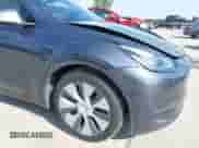 2022 Tesla Model Y Long Range z VIN 7SAYGAEE7NF389319, wystawiony jako IAAI lot #42492523 z przebiegiem Nie podano mil oraz . Historia ofert i sprzedaży dostępna na DreamBid. Obrazek 10.