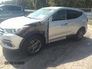 2017 Hyundai Santa Fe 2.4L z VIN 5XYZT3LB4HG456926, wystawiony jako IAAI lot #43207286 z przebiegiem 156 221 mil mil oraz . Historia ofert i sprzedaży dostępna na DreamBid. Obrazek 2.