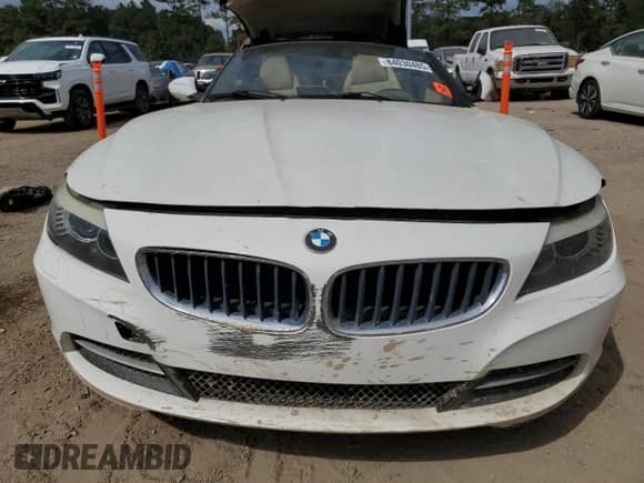 2011 BMW Z4 sDrive30i with VIN WBALM5C53BE379990, listed as a Copart auction lot 84030485 with Not provided miles and Salvage title. Bid and sale history available at DreamBid. Image 5.