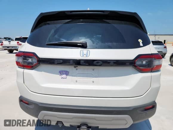 2024 Honda Pilot EX-L с VIN 5FNYG2H43RB017049, выставлен на аукционе Copart как лот 59206365 с пробегом 24 867 миль миль и Списание • Salvage title. История ставок и продаж доступна на DreamBid. Изображение 6.