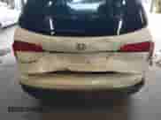 2018 Honda Pilot EX-L with VIN 5FNYF5H57JB031523, listed as a IAAI auction lot 43169866 with 109,412 mi miles and . Bid and sale history available at DreamBid. Image 6.