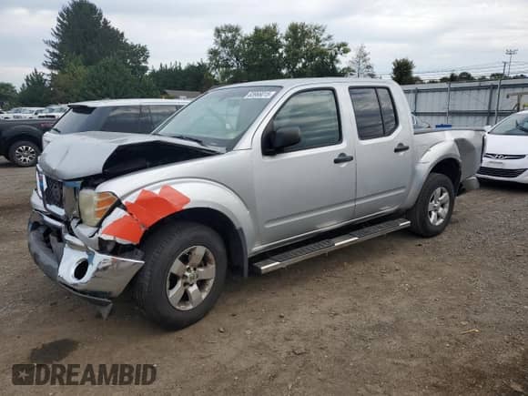 2009 Nissan Frontier SE with VIN 1N6AD07W09C407876, listed as a Copart auction lot 83966015 with Not provided miles and Salvage title. Bid and sale history available at DreamBid. Image 1.