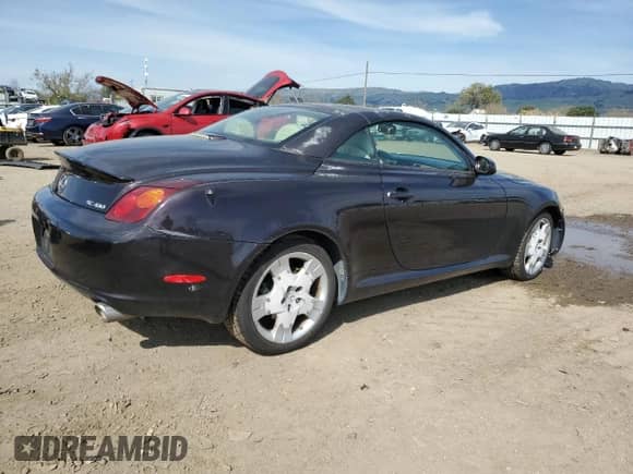 2004 Lexus SC 430 with VIN JTHFN48Y640056039, listed as a Copart auction lot 48590735 with 117,295 mi miles and Salvage title. Bid and sale history available at DreamBid. Image 3.