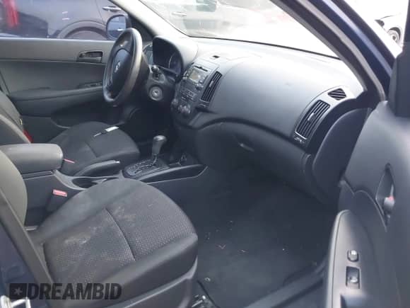 2012 Hyundai Elantra GLS z VIN KMHDB8AEXCU129926, wystawiony jako IAAI lot #43161581 z przebiegiem 185 638 mil mil oraz . Historia ofert i sprzedaży dostępna na DreamBid. Obrazek 5.