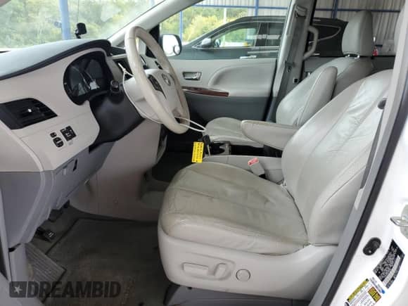 2012 Toyota Sienna XLE with VIN 5TDYK3DC8CS205280, listed as a Copart auction lot 81258065 with 185,820 mi miles and Salvage title. Bid and sale history available at DreamBid. Image 7.