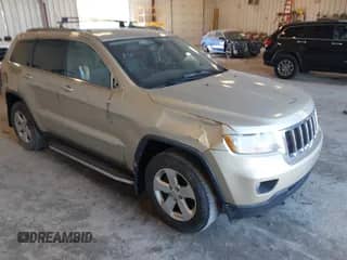 2012 Jeep Grand Cherokee Laredo with VIN 1C4RJFAG8CC153943, listed as a IAAI auction lot 43371764 with 218,266 mi miles and . Bid and sale history available at DreamBid. Image 1.