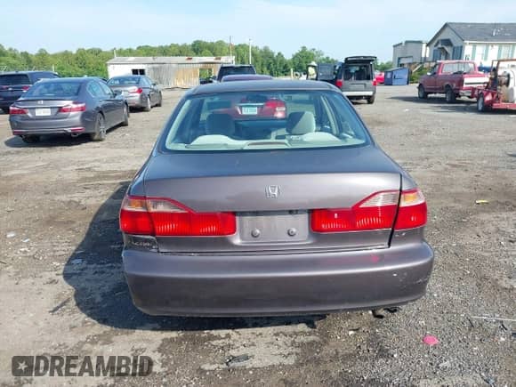 1999 Honda Accord LX with VIN 1HGCG6654XA100896, listed as a IAAI auction lot 42613354 with 154,176 mi miles and . Bid and sale history available at DreamBid. Image 16.