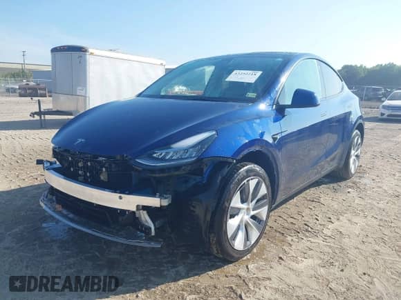 2023 Tesla Model Y Long Range with VIN 7SAYGDEE4PA125024, listed as a IAAI auction lot 43252218 with 21,200 mi miles and . Bid and sale history available at DreamBid. Image 20.
