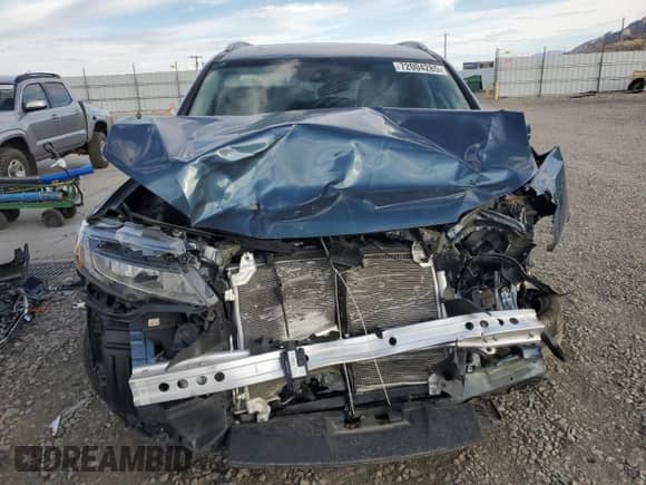 2020 Honda Pilot Touring 8-Passenger z VIN 5FNYF6H97LB001613, wystawiony jako Copart lot #72004285 z przebiegiem Nie podano mil oraz Szkoda całkowita • Salvage title. Historia ofert i sprzedaży dostępna na DreamBid. Obrazek 5.