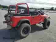 1995 Jeep Wrangler S with VIN 1J4FY19P3SP285709, listed as a Copart auction lot 69659545 with 200,636 mi miles and Salvage title. Bid and sale history available at DreamBid. Image 3.