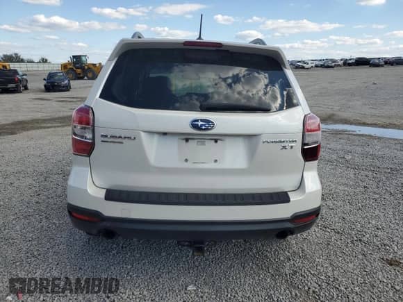 2015 Subaru Forester XT Touring with VIN JF2SJGUC5FH835803, listed as a Copart auction lot 81013615 with 102,853 mi miles and Salvage title. Bid and sale history available at DreamBid. Image 6.