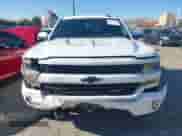 2018 Chevrolet Silverado 1500 LT with VIN 1GCUKRECXJF180945, listed as a IAAI auction lot 42450588 with 108,199 mi miles and . Bid and sale history available at DreamBid. Image 12.