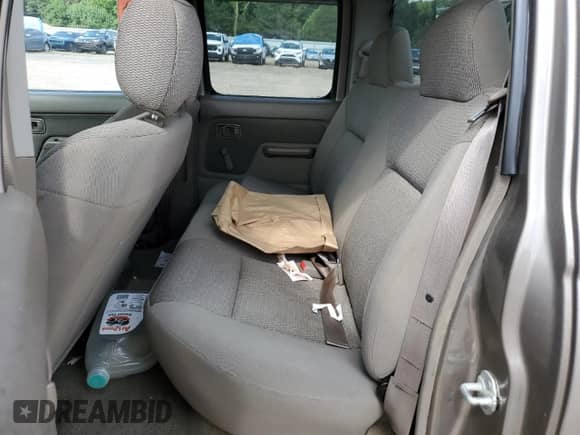 2003 Nissan Frontier SE с VIN 1N6ED27T43C434461, выставлен на аукционе Copart как лот 58852615 с пробегом Не указан миль и Списание • Salvage title. История ставок и продаж доступна на DreamBid. Изображение 10.