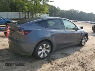 2023 Tesla Model Y Long Range with VIN 7SAYGAEE4PF668889, listed as a Copart auction lot 67239314 with 26,874 mi miles and Salvage title. Bid and sale history available at DreamBid. Image 3.