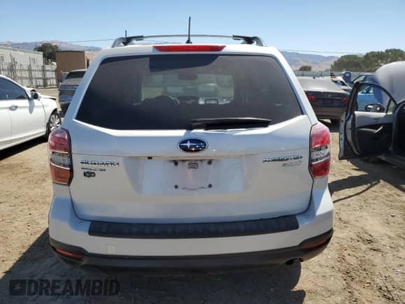 2014 Subaru Forester Premium with VIN JF2SJACC7EG459947, listed as a Copart auction lot 64106135 with 151,033 mi miles and Salvage title. Bid and sale history available at DreamBid. Image 6.